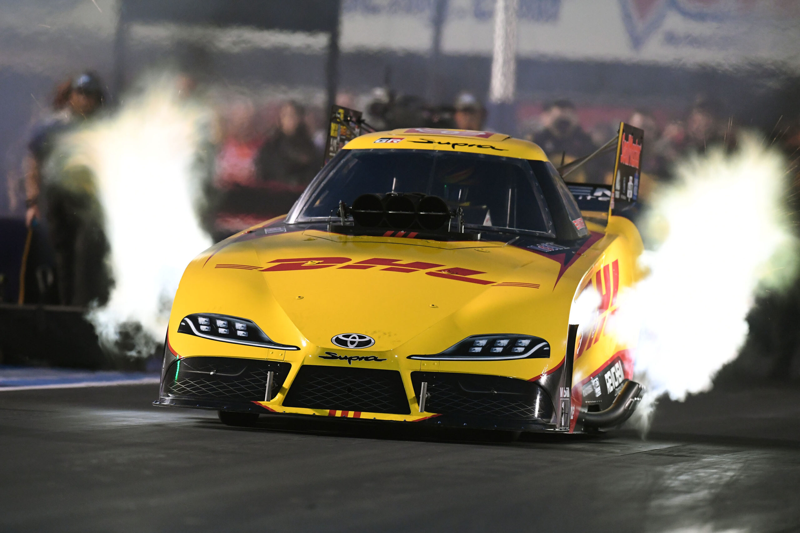 YPSILANTI, Mich. (March 4, 2024) — In one of the longest-running and most-successful sports marketing partnerships, DHL and Kalitta Motorsports signed a multi-year contract extension for J.R. Todd’s DHL GR Supra Funny Car, the team announced today. The 2024 NHRA Mission Foods Drag Racing Series begins Friday at the Amalie Oil NHRA Gatornationals in Gainesville, Fla.